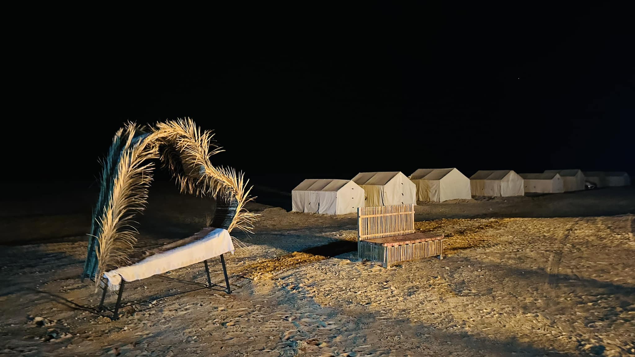 Traditional desert camp tent prepared for overnight stay during Douz sahara camel trek