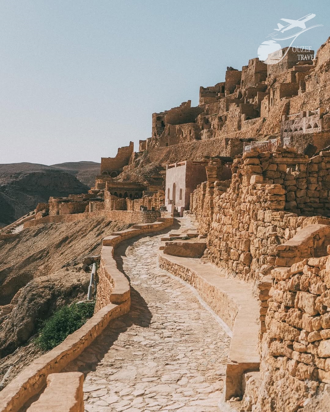 View of Chenini, a Berber mountain village with cave houses and historical mosques in southern Tunisia